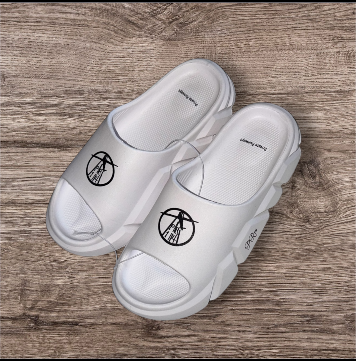 PR14 Whiteout Foam Slides from Private Runways